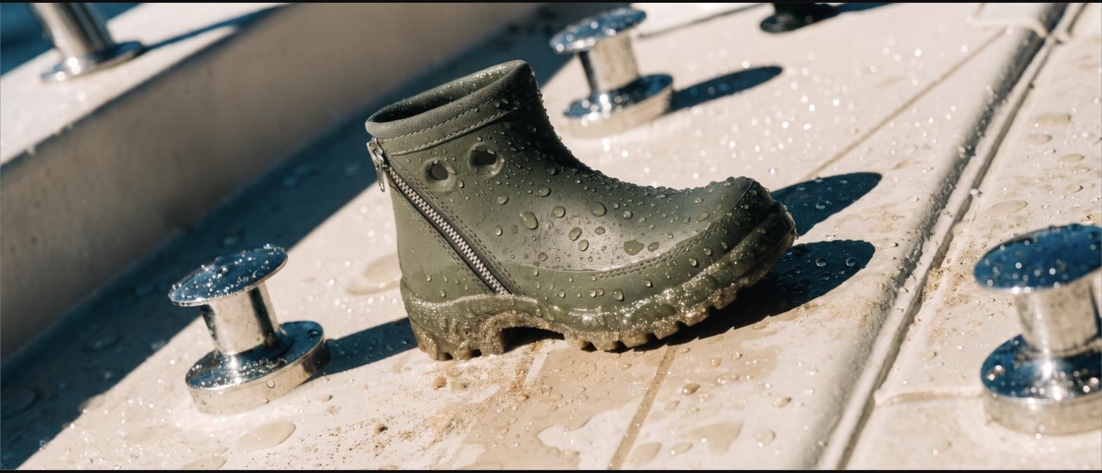 Wet flats bootie draining on the deck of a skiff